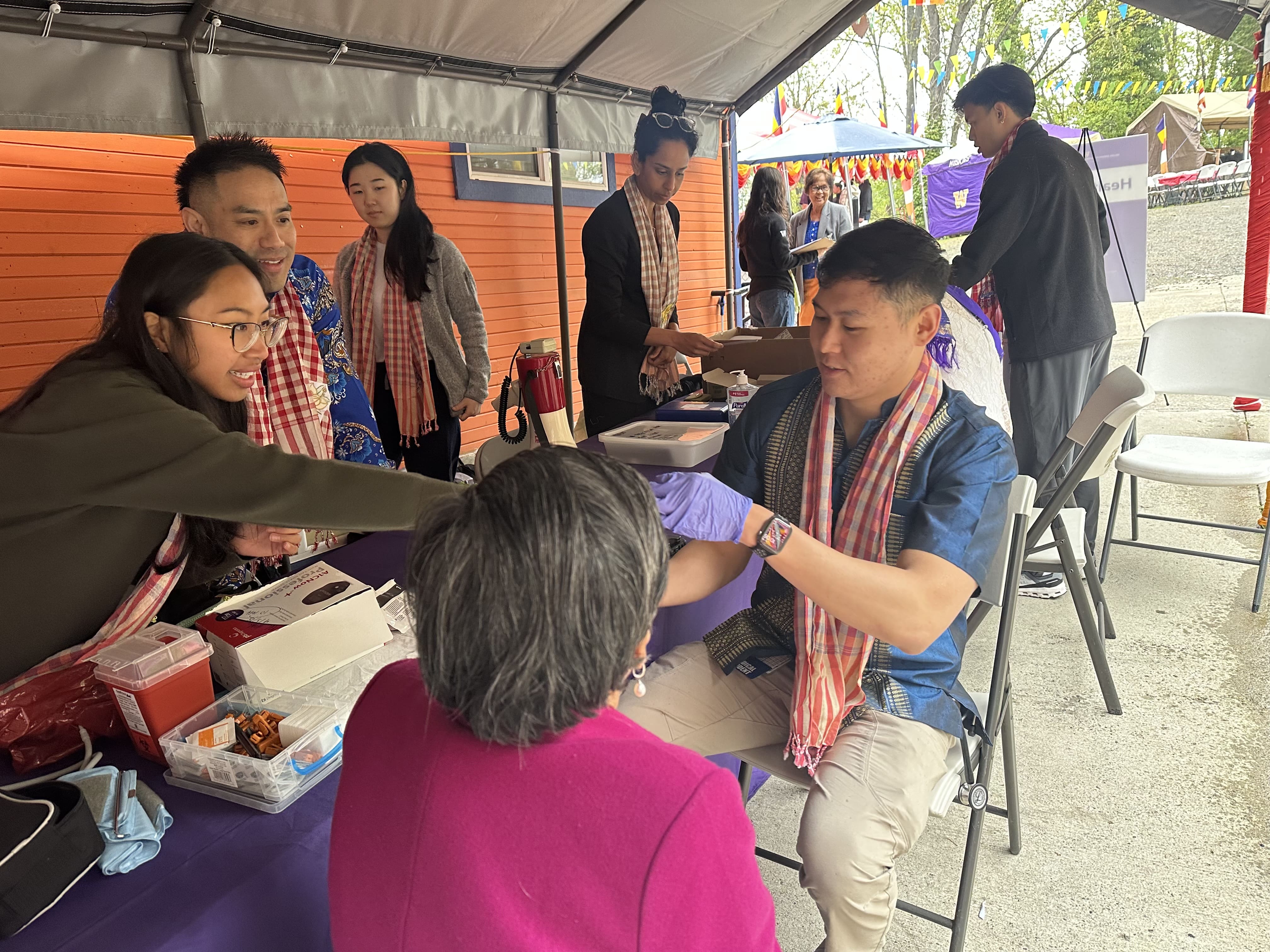 UW School of Medicine students provide free health screenings to attendees of the Khmer New Year celebration