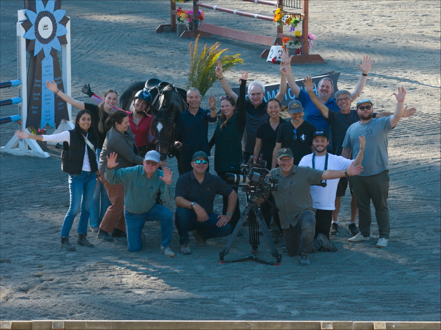 A group photo of the cast and crew of the equestrian sports safety video