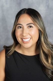 A headshot of Kenya Morales