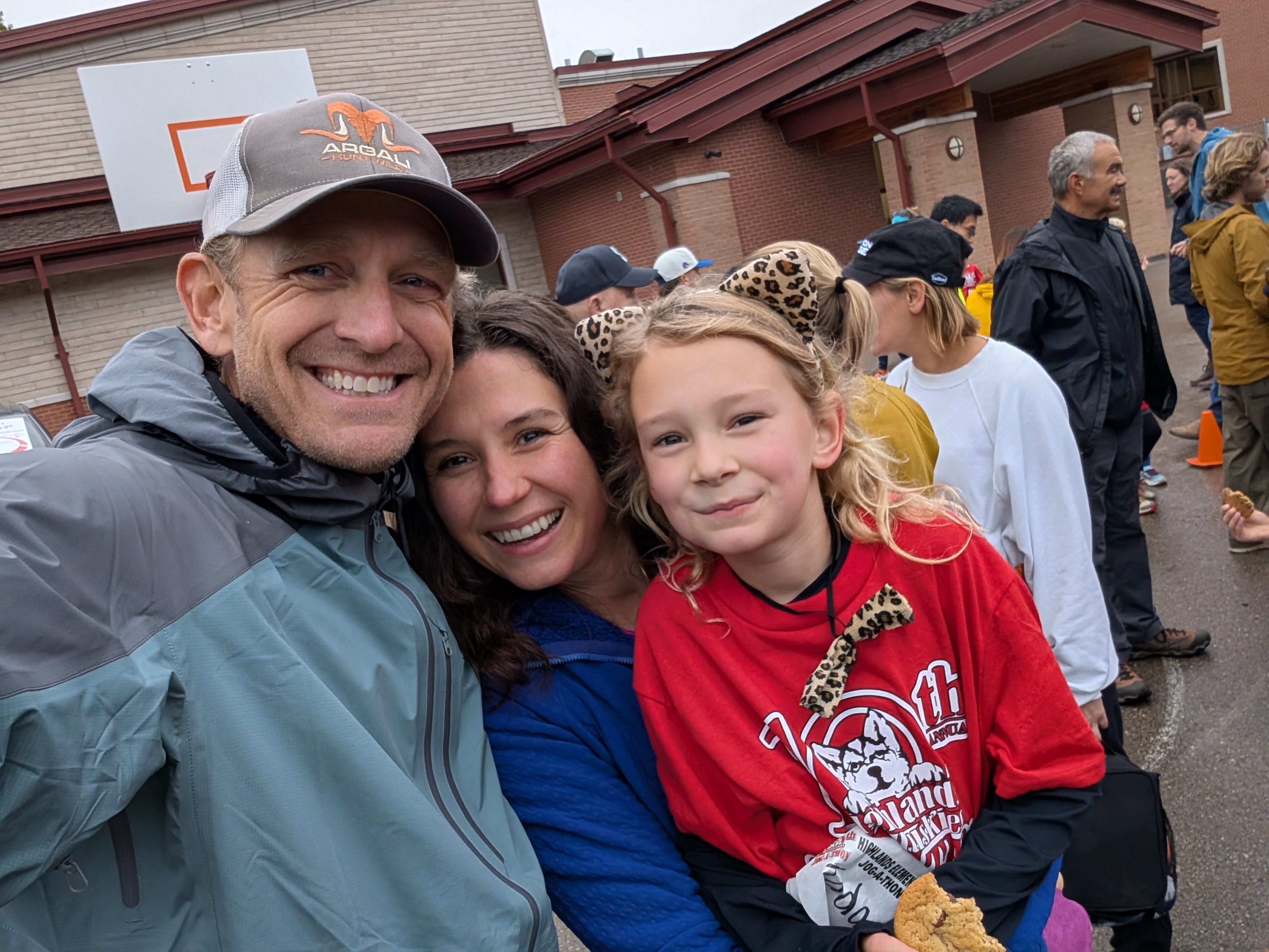 Dr. Kara Kuntz with her husband and daughter