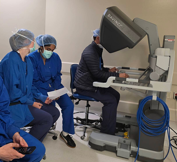 Students observe Dr. Matousek performing lung surgery on the DaVinci robot
