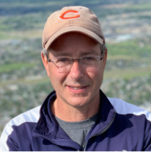A headshot of Tim strizich