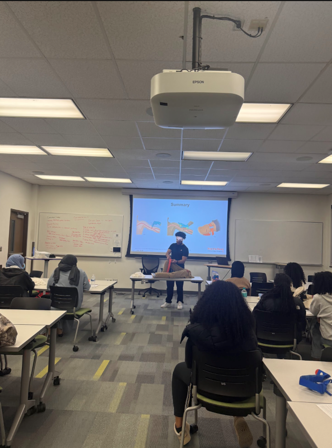 Gharib leads a presentation about firearm safety and injury prevention