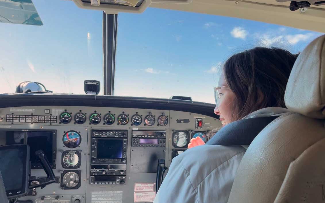 Cara Chapman in the front seat of the airplane that took her to Galena